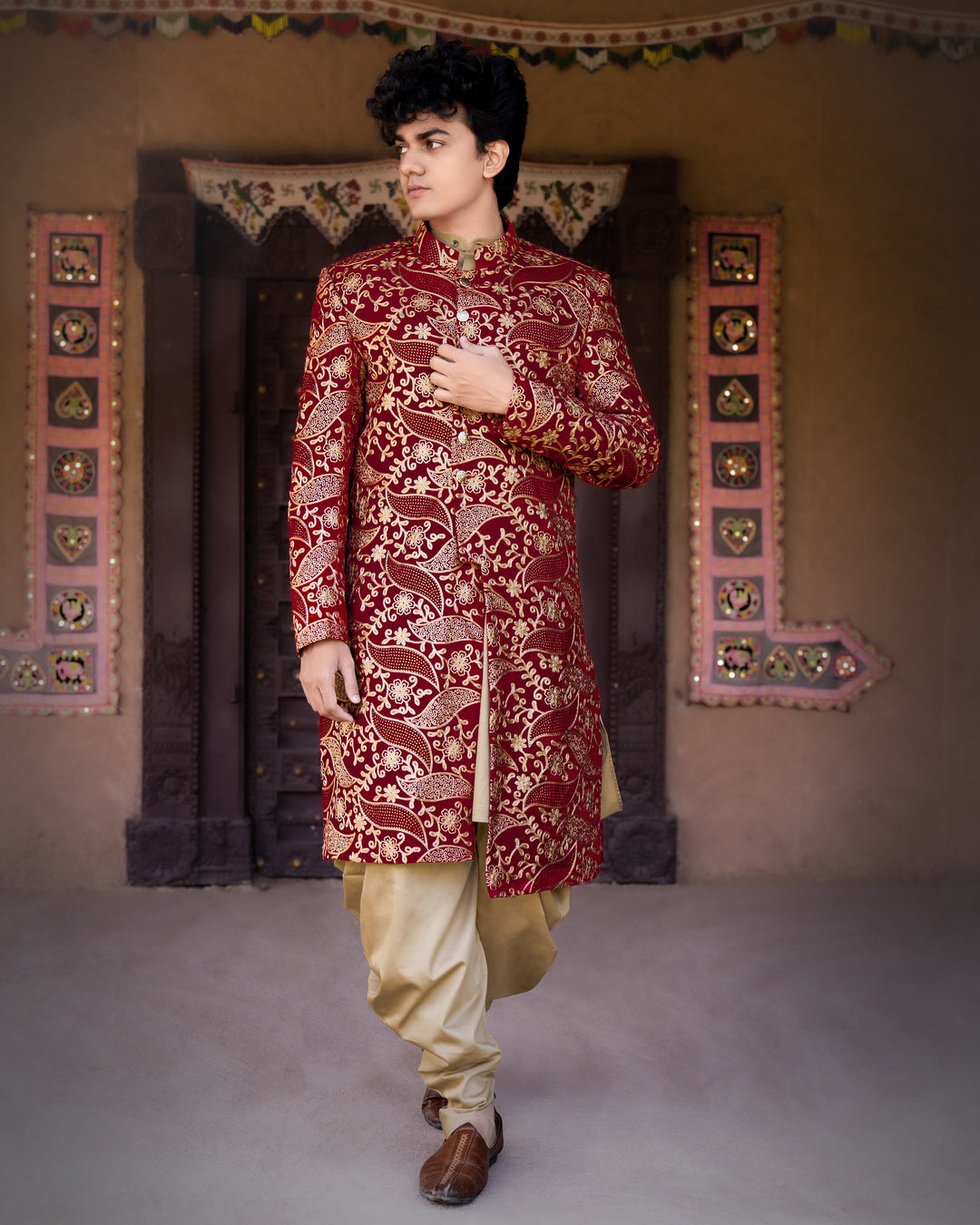 SCARLET MAROON VELVET EMBROIDERED AND TIKKI WORK SHERWANI WITH KURTA, DHOTI SET